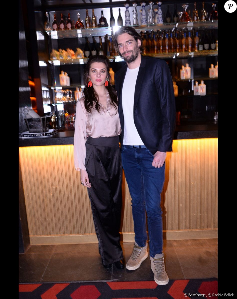 Camille Lacourt et sa compagne Alice Detollenaere (Miss Bourgogne 2010) à la soirée de lancement de "Chez Blue" au club "Boum Boum". Paris le 30 janvier 2020. © Rachid Bellak/Bestimage