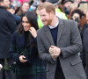 Le prince Harry et Meghan Markle en visite dans la ville de Edimbourg en Ecosse, trois mois avant leur mariage.