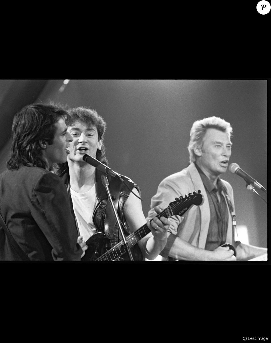 Archives - Jean-Jacques Goldman, Michael Jones et Johnny Hallyday dans l'émission "Champs-Elysées".