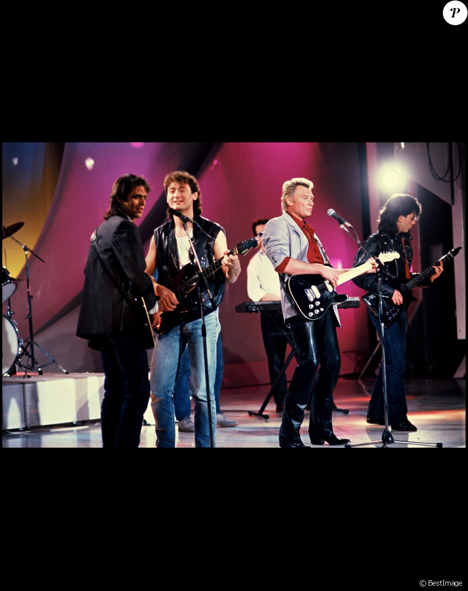 Archives - Jean-Jacques Goldman, Michael Jones et Johnny Hallyday lors de l'émission "Champs Elysées".
