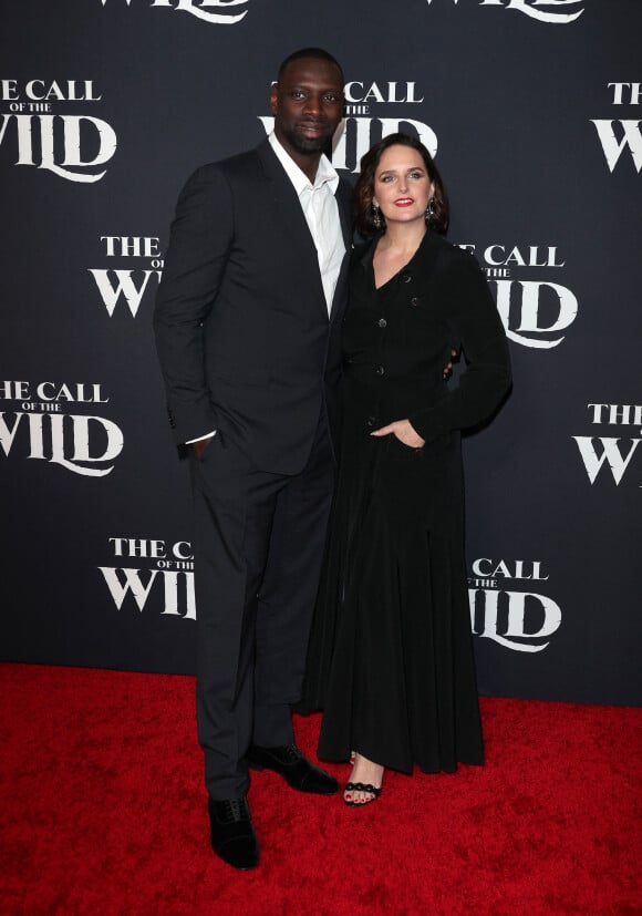 Omar Sy et sa femme Hélène Sy - Photocall de la première du film L'Appel de la forêt à Los Angeles le 13 février 2020.