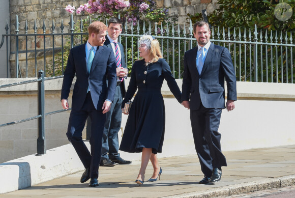 Le prince Harry, duc de Sussex, Peter Phillips et Autumn Phillips arrivent pour assister à la messe de Pâques à la chapelle Saint-Georges du château de Windsor, le 21 avril 2119.