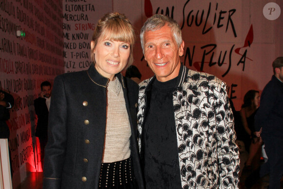 Nagui et sa femme Mélanie Page lors du vernissage de l'exposition consacrée à l'oeuvre et l'imaginaire de Christian Louboutin "l'Exhibitionniste' (L'Exibition[niste]) au Palais de la Porte Dorée, à Paris, France, le 24 février 2020. © Philippe Baldini/Bestimage