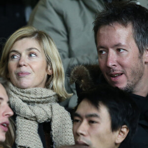 Jean-Luc Lemoine et sa compagne Adeline - People lors du match de football Psg contre Lille au parc des Princes a Paris le 22 decembre 2013.