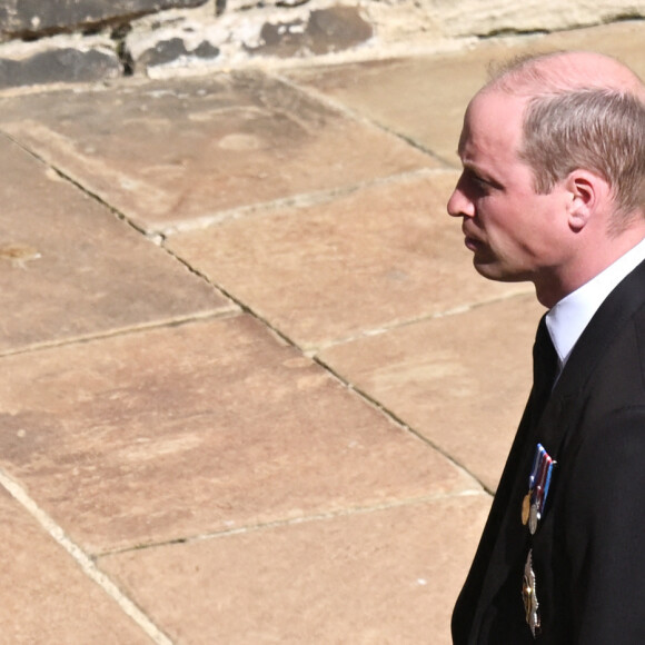 Le prince Harry, duc de Sussex, Peter Phillips, le prince William, duc de Cambridge - Arrivées aux funérailles du prince Philip, duc d'Edimbourg à la chapelle Saint-Georges du château de Windsor, le 17 avril 2021.