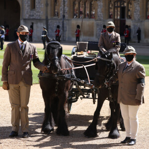La calèche du prince Philip, duc d'Edimbourg, et ses deux chevaux Balmoral Nevis et Notlaw Storm lors des funérailles du prince Philip, duc d'Edimbourg à la chapelle Saint-Georges du château de Windsor, Royaume Uni, le 17 avril 2021.