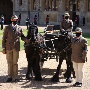 La calèche du prince Philip, duc d'Edimbourg, et ses deux chevaux Balmoral Nevis et Notlaw Storm lors des funérailles du prince Philip, duc d'Edimbourg à la chapelle Saint-Georges du château de Windsor, Royaume Uni, le 17 avril 2021.