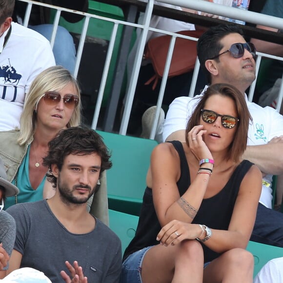 Laure Manaudou et son compagnon Jérémy Frérot dans les tribunes lors de la finale des Internationaux de tennis de Roland-Garros à Paris, le 7 juin 2015.