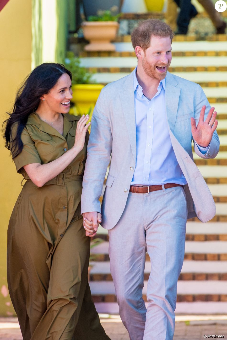 Le prince Harry, duc de Sussex, et Meghan Markle, duchesse de Sussex, lors des célébrations de la fête du patrimoine dans le quartier de Bo Kaap dit "Cape Malay" au Cap, Afrique du Sud, le 24 septembre 2019.