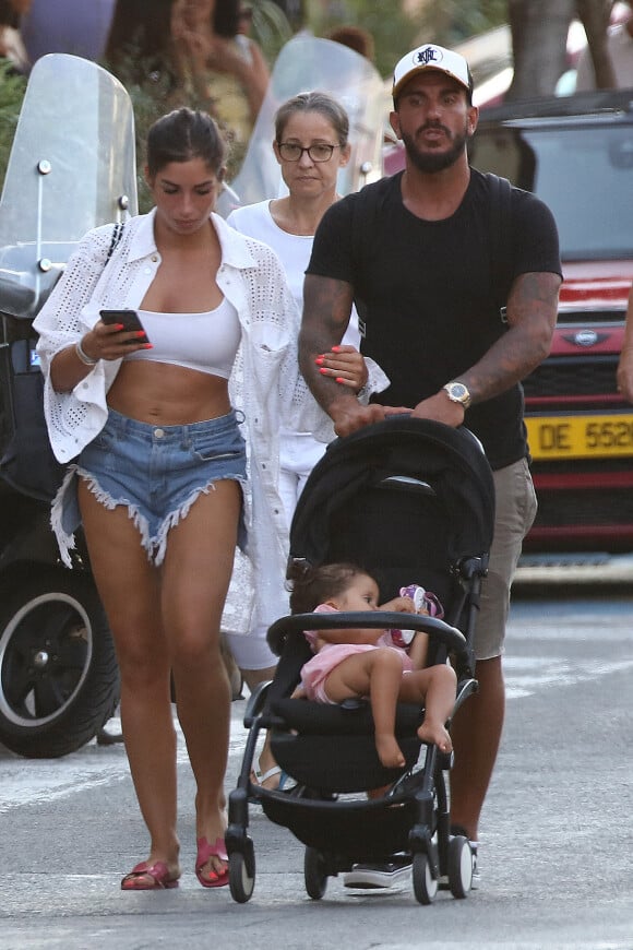 Exclusif - Liam Di Benedetto, sa fille Joy et son compagnon Christophe Dicranian se promènent dans les rues de Saint-Tropez. Le 22 juillet 2020