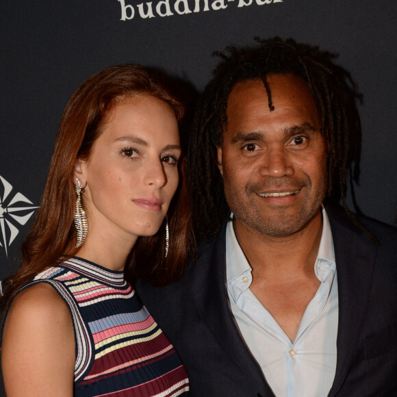 Christian Karembeu et sa femme Jackie Chamoun - A l'occasion des 20 ans de la victoire de l'équipe de France, les bleus 98 se sont rendus à un dîner organisé au Buddha Bar avec tous les joueurs et leur famille. © Rachid Bellak/Bestimage 