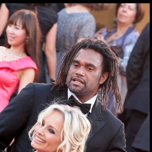 Christian et Adriana Karembeu - Montée des marches du film "Biutiful" - 63 ème Festival du Film de Cannes.