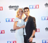 Ophélie Winter et Christophe Licata - Photocall de présentation de la nouvelle saison de "Danse avec les Stars 5" au pied de la tour TF1 à Paris, le 10 septembre 2014.