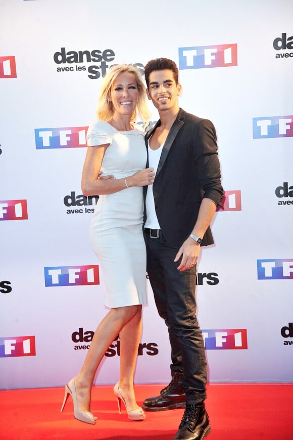 Ophélie Winter et Christophe Licata - Photocall de présentation de la nouvelle saison de "Danse avec les Stars 5" au pied de la tour TF1 à Paris, le 10 septembre 2014.