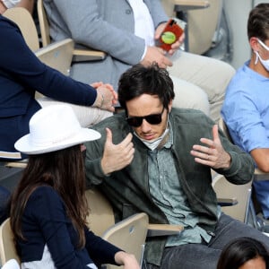 Vianney (Vianney Bureau) et sa compagne Catherine Robert (enceinte) dans les tribunes des Internationaux de France de tennis de Roland Garros à Paris, France, le 5 juin 2021. © Dominique Jacovides/Bestimage 