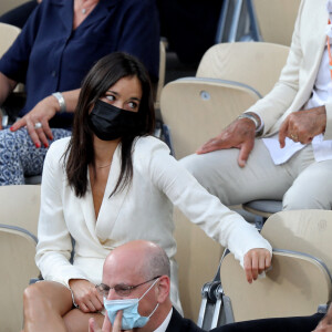 Tony Parker et sa compagne Alizé Lim dans les tribunes des Internationaux de France de Tennis de Roland Garros. Paris, le 9 juin 2021 © Dominique Jacovides / Bestimage