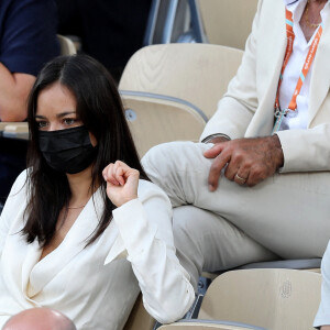 Tony Parker et sa compagne Alizé Lim dans les tribunes des Internationaux de France de Tennis de Roland Garros. Paris, le 9 juin 2021 © Dominique Jacovides / Bestimage