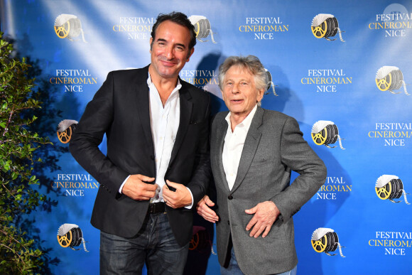 Jean Dujardin et Roman Polanski durant la soirée de clôture de la 1ere édition du Festival Ciné Roman à Nice. © Bruno Bebert / Bestimage