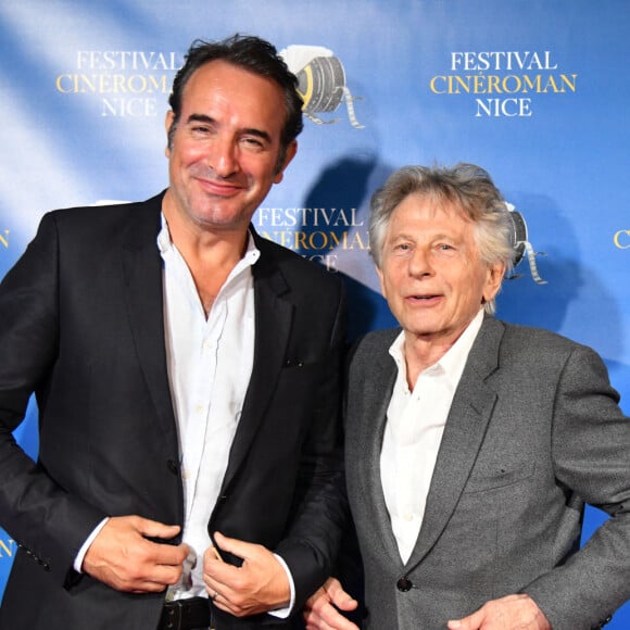 Jean Dujardin et Roman Polanski durant la soirée de clôture de la 1ere édition du Festival Ciné Roman à Nice. © Bruno Bebert / Bestimage