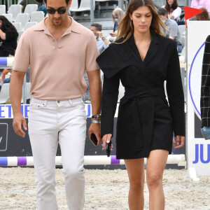 Exclusif - Iris Mittenaere et son compagnon Diego El Glaoui assistent au Longines Paris Eiffel Jumping au Champ de Mars, le 26 juin 2021. © Veeren / Bestimage 