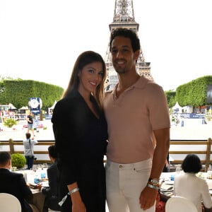 Exclusif - Iris Mittenaere et son compagnon Diego El Glaoui assistent au Longines Paris Eiffel Jumping au Champ de Mars, le 26 juin 2021. © Veeren / Bestimage 