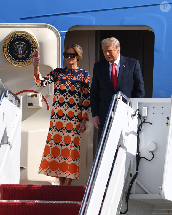 Donald Trump et sa femme Melania à leur arrivée, à bord de Air Force One, à l'aéroport international de Palm Beach. Le 20 janvier 2021.