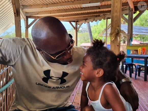 Teddy Riner et sa fille Isis.