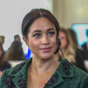 Meghan Markle la duchesse de Sussex enceinte et le prince Harry, duc de Sussex, assistent à une activité jeunesse le Jour du Commonwealth à la Maison du Canada le 11 mars 2019 à Londres