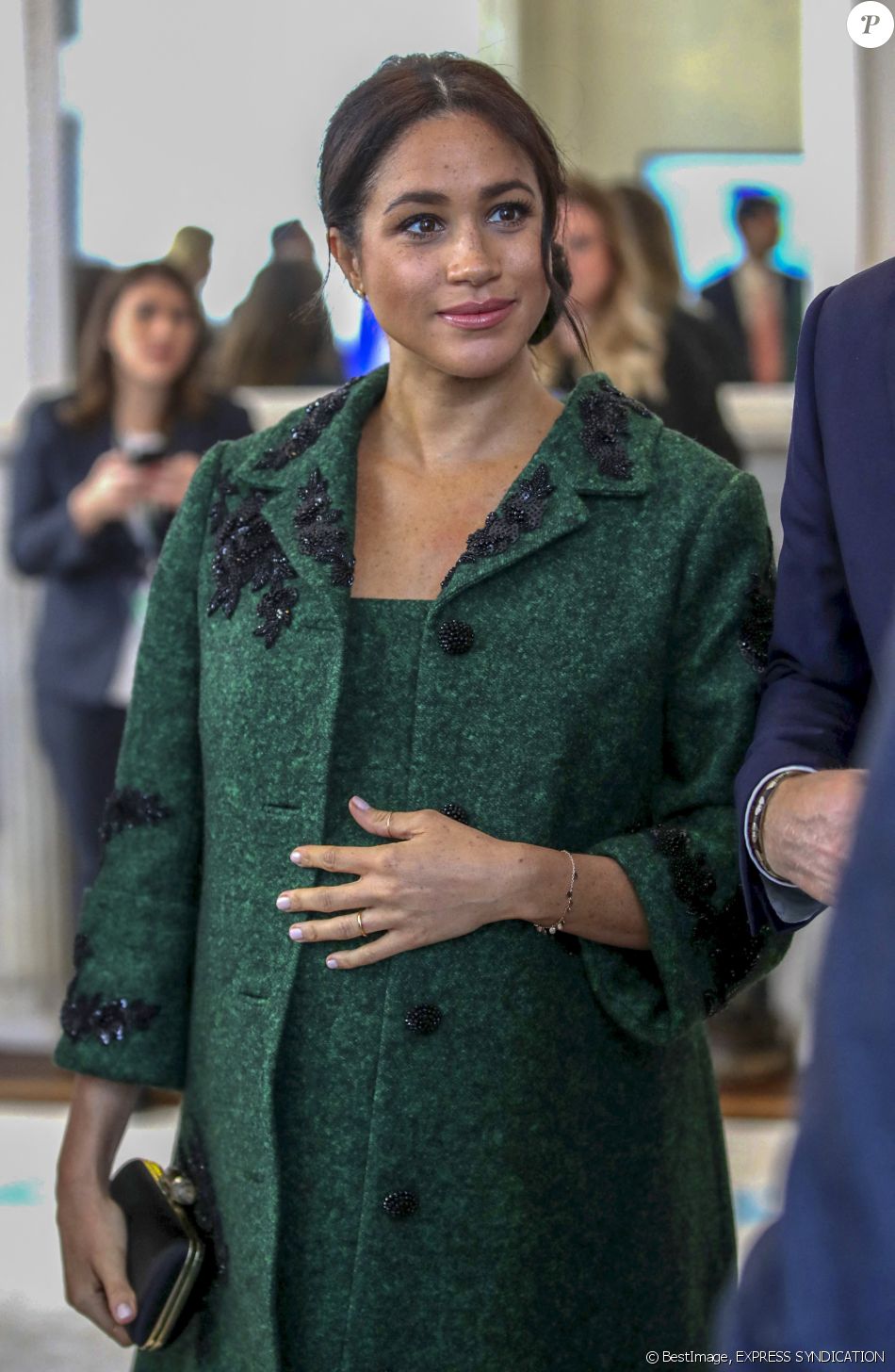 Meghan Markle la duchesse de Sussex enceinte et le prince Harry, duc de Sussex, assistent à une activité jeunesse le Jour du Commonwealth à la Maison du Canada le 11 mars 2019 à Londres