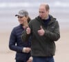 Le prince William et Catherine Kate Middleton font un tour de char à voile sur la plage Saint Andrews dans le comté de East Lothian en Ecosse.
