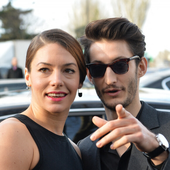 Pierre Niney et sa compagne Natasha Andrews - Arrivées des people au défilé de mode hommes Dior collection prêt-à-porter Automne Hiver 2015/2016 au Tennis Club de Paris le 24 janvier 2015.