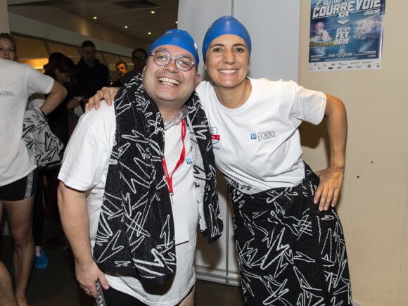 Yoann Riou et Estelle Denis lors du Challenges Swimming Heroes pour l'UNICEF lors du meeting Olympique à la piscine de Courbevoie, France, le 24 février 2019. © Pierre Perusseau/Bestimage 