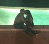 David Ginola et sa compagne Maëva partagent un moment de complicité à leur domicile, près de la piscine. Septembre 2021.