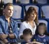Faustine Bollaert, son mari Maxime Chattam et leurs enfants Abbie et Peter sont en tribune lors de la rencontre de football Paris Saint Germain PSG contre Clermont (4-0) au Parc des Princes à Paris le 11 septembre 2021.
