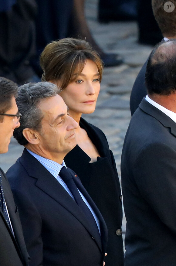 Nicolas Sarkozy et Carla Bruni-Sarkozy - Hommage national à Charles Aznavour à l'Hôtel des Invalides à Paris. © Jacovides-Moreau / Bestimage