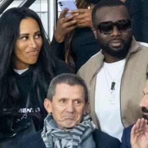 Maitre Gims et sa femme Demdem - People assistent à la victoire du PSG (2) face à Manchester City (0) lors de la deuxième journée de la Ligue des champions au Parc des Princes à Paris le 28 septembre 2021. © Cyril Moreau/Bestimage