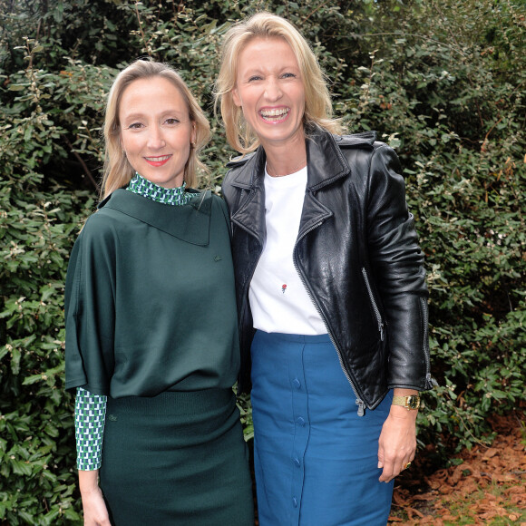 Audrey Lamy et sa soeur Alexandra Lamy - People au défilé Lacoste Collection Prêt-à-Porter Printemps/Eté 2020 lors de la Fashion Week de Paris, le 1er octobre 2019. © Veeren Ramsamy-Christophe Clovis/Bestimage 