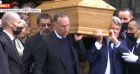 Jean-Pierre Papin, Basile Boli, Jean-Louis Borloo portant le cercueil de Bernard Tapie à la sortie de la messe hommage qui s'est déroulée en l'église Saint-Germain-des-Prés, à Paris.