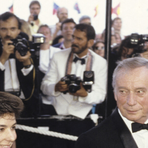 Yves Montand et sa femme Carole Amiel au Festival de Cannes en 1989. © Michel Marizy via Bestimage