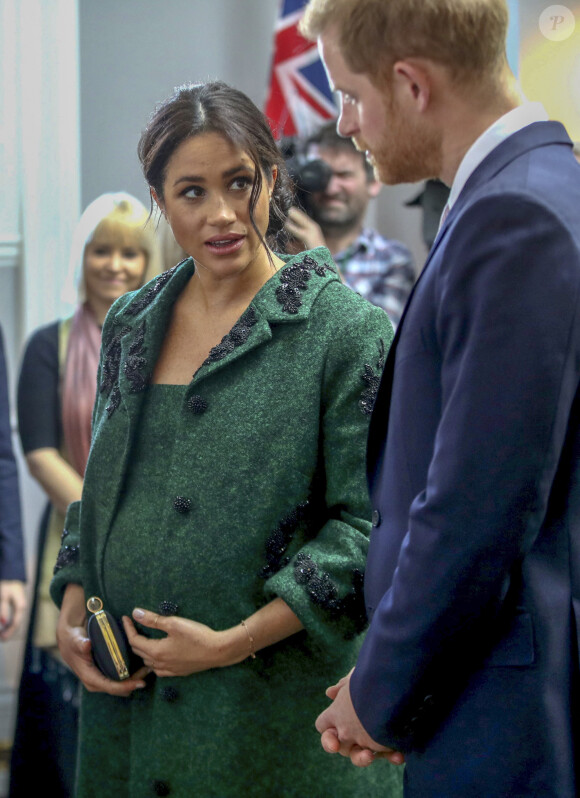 Meghan Markle (enceinte de son fils Archie) et le prince Harry assistent à une activité jeunesse le Jour du Commonwealth à la Maison du Canada le 11 mars 2019 à Londres.