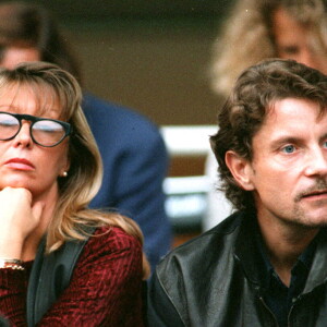 Francis et Mariette Cabrel assistent à un match de football.