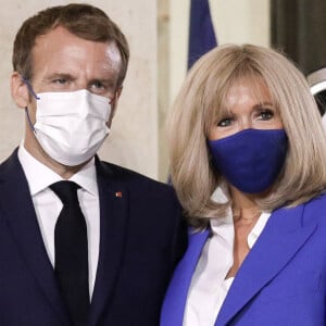 Le président de la République, Emmanuel Macron et la première dame, Brigitte Macron recoivent Kyriakos Mitsotakis, Premier ministre de la République Hellénique et son épouse Mareva Grabowski pour un diner de travail, au palais de l'Elysée, Paris, le 27 septembre 2021.