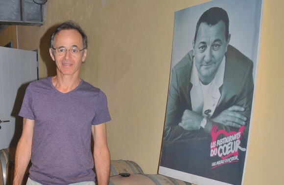Jean-Jacques Goldman - Vente aux enchères à l'occasion du 20ème anniversaire du spectacle "Les Vendanges du Coeur" à Ouveillan, près de Narbonne (Aude) au profit des "Restos du Coeur" le 20 juillet 2014.