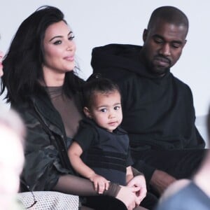 Kim Kardasian, North West et Kanye West lors du défilé YEEZY SEASON 1 (adidas Originals x Kanye West) au Skylight Clarkson Square. New York, le 12 février 2015.