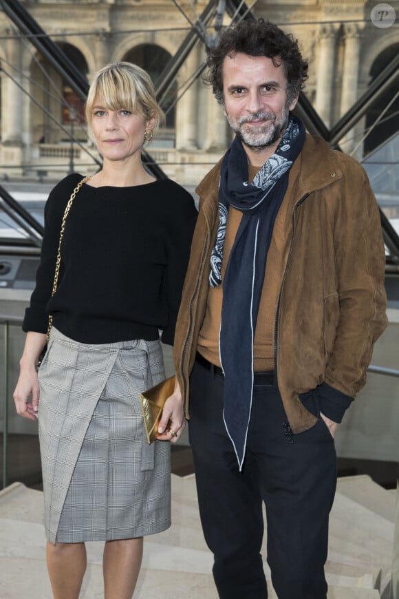 Marina Foïs et Eric Lartigau au défilé de mode "Louis Vuitton", collection prêt-à-porter Automne-Hiver 2017-2018 au musée du Louvre à Paris, le 7 Mars 2017.© Olivier Borde/Bestimage