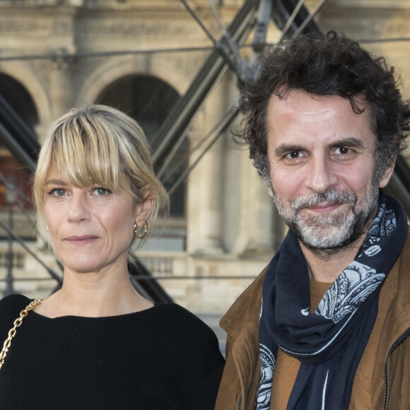 Marina Foïs et Eric Lartigau au défilé de mode "Louis Vuitton", collection prêt-à-porter Automne-Hiver 2017-2018 au musée du Louvre à Paris, le 7 Mars 2017.© Olivier Borde/Bestimage