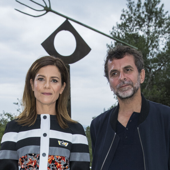 Marina Foïs et Eric Lartigau - Front row au défilé de la collection croisière Louis Vuitton 2019 dans les jardins de la fondation d'art Maeght à Saint-Paul-De-Vence, France, le 28 mai 2018. © Olivier Borde/Bestimage
