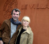 Marina Foïs et Eric Lartigau - People au village des Internationaux de France de tennis de Roland Garros à Paris.