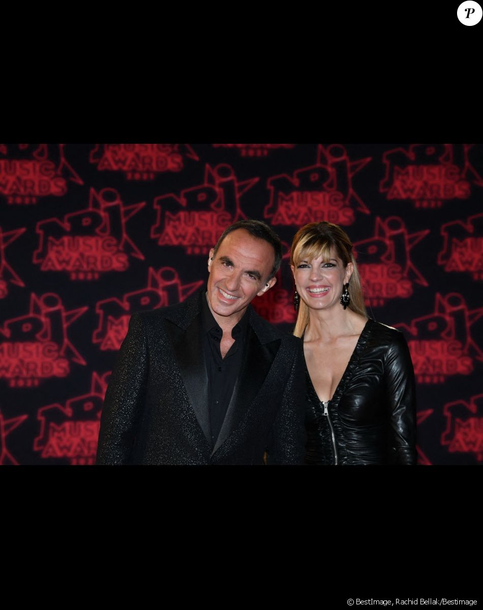 Nikos Aliagas et sa compagne Tina Grigoriou lors de la 23ème édition des NRJ Music Awards 2021 au Palais des Festivals de Cannes, le 20 novembre 2021. © Rachid Bellak/Bestimage