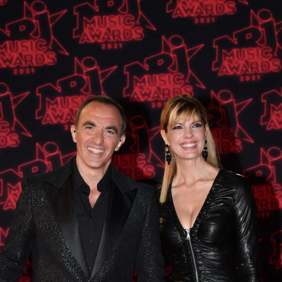 Nikos Aliagas et sa compagne Tina Grigoriou lors de la 23ème édition des NRJ Music Awards 2021 au Palais des Festivals de Cannes, le 20 novembre 2021. © Rachid Bellak/Bestimage 